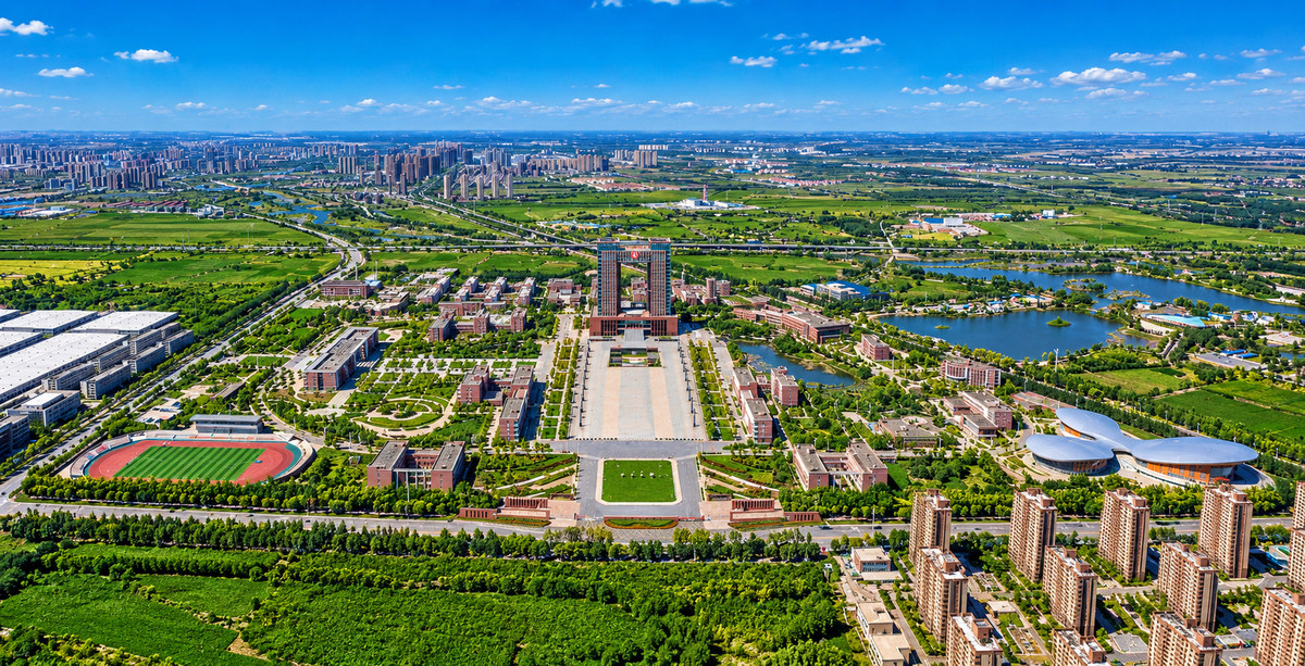 China Medical University — Shenbei campus aerial with sports facilities and lake