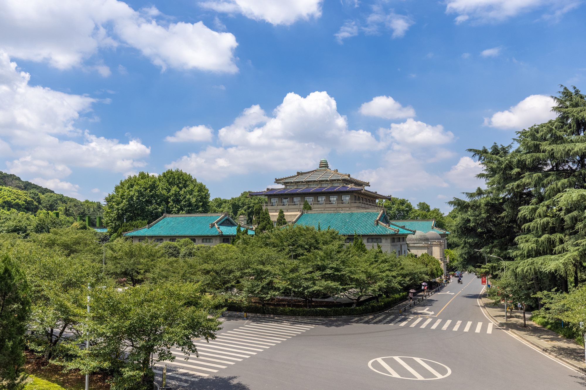 Wuhan University — Historic campus architecture beneath a summer sky.
